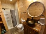 Lower Level Bathroom with Shower. Accessible from Den and from Queen Bedroom